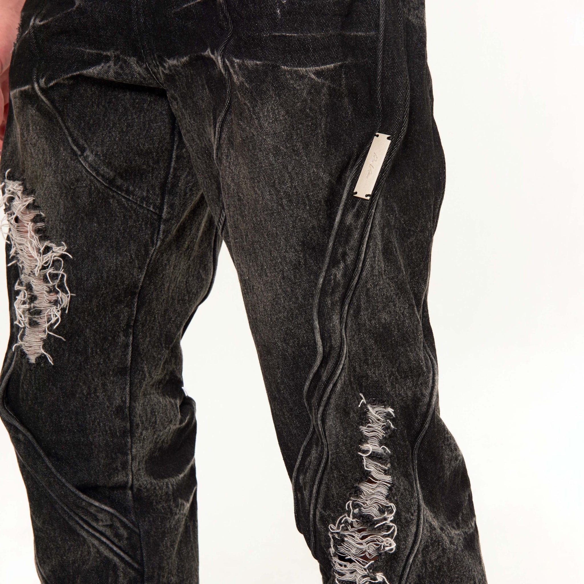 RAF VALOIS 23SS "WORLD FUCK ME" corroded denim jeans with embedded metal keels