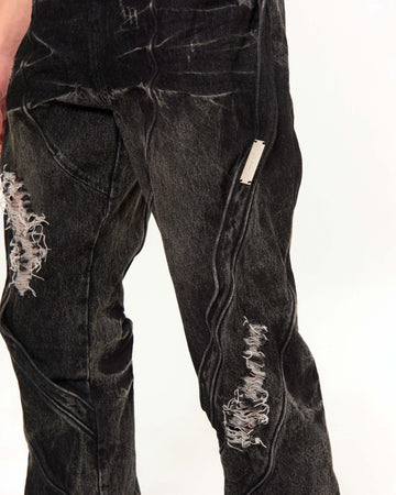 RAF VALOIS 23SS "WORLD FUCK ME" corroded denim jeans with embedded metal keels